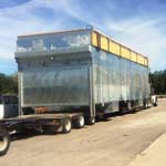 Loading very large heat exchanger on truck.