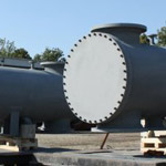 Large monel clad shell and tube heat exchanger.